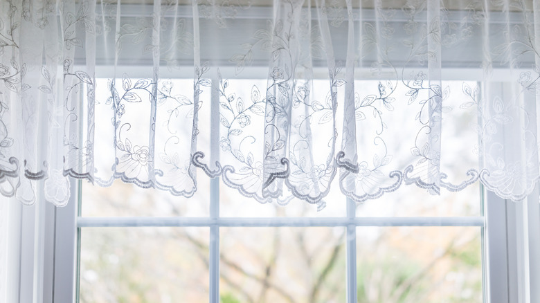close up of net curtains on windows