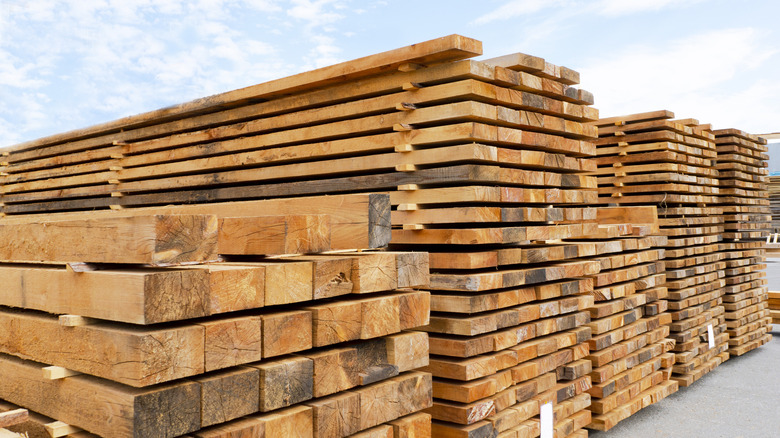 A stack of lumber in a lumber yard