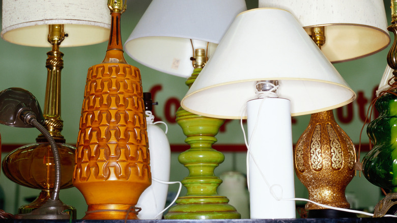 lamps on a thrift store shelf