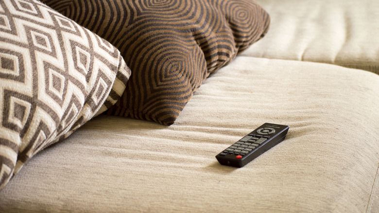 tv remote on a couch