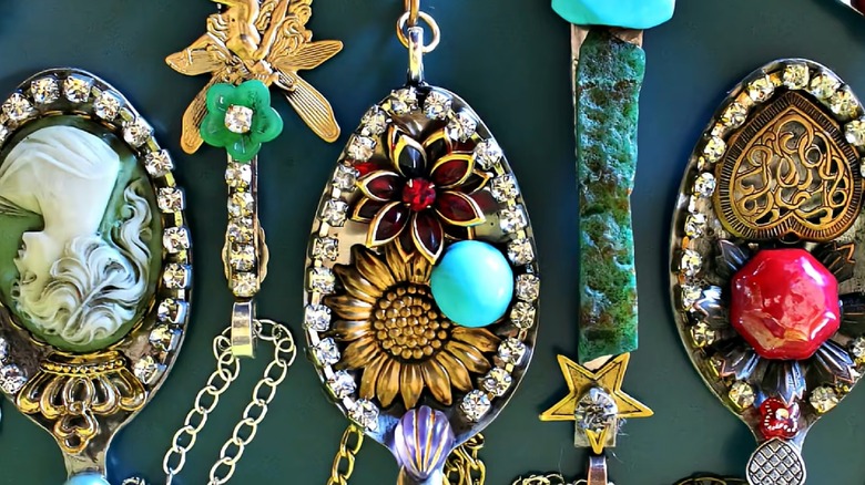 Spoon pendants made with pearls and gems.