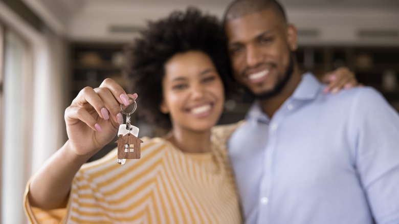 couple with house keys