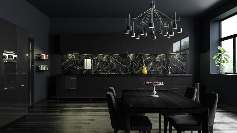 room with black walls and ceiling