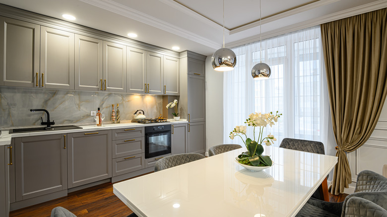 Modern kitchen with curtains