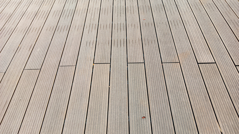 A PVC decking in a grey wood color