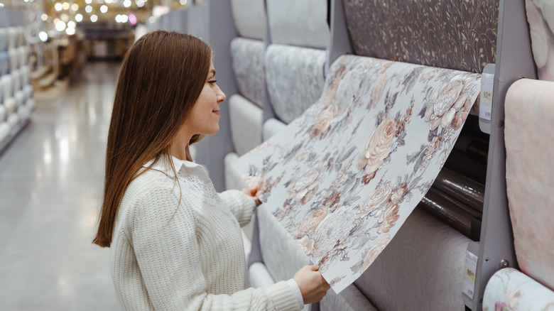woman shopping for wallpaper