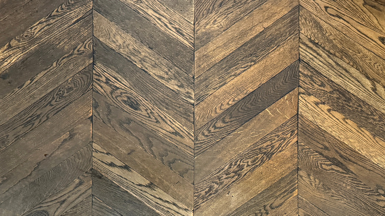 Closeup photo of chevron patterned wooden floor