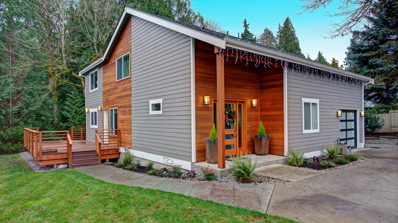 A home with two different colors of wood-look siding