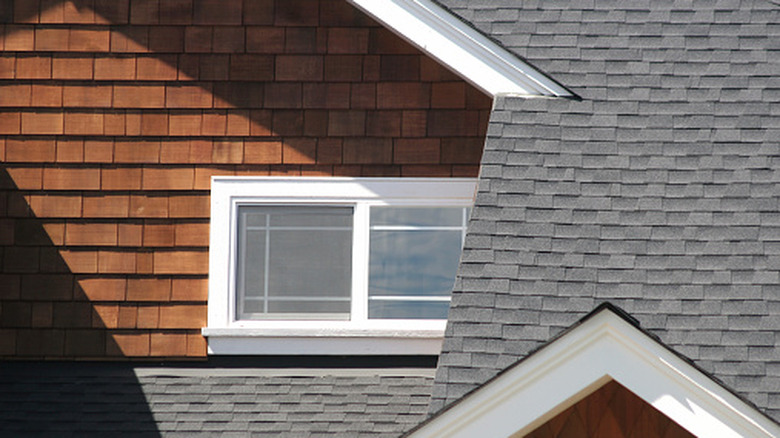 Zoomed-in shot of a house facade with cedar shake siding