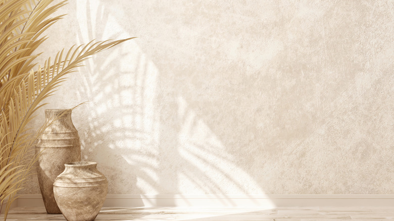 Empty room interior background, blank beige plaster wall