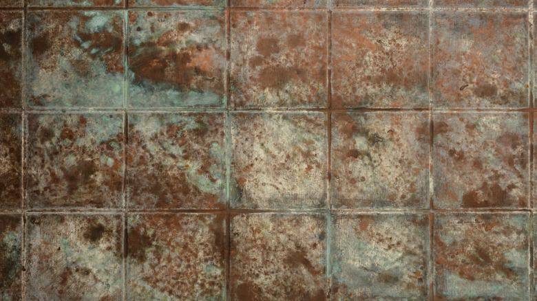 Copper and bronze tiles with oxidation