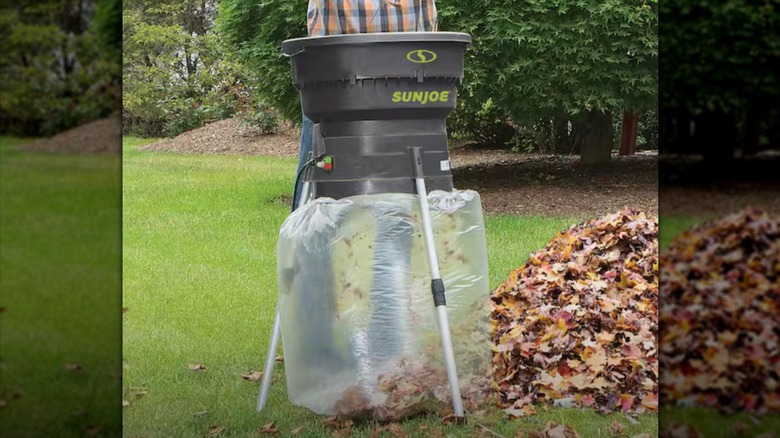 Sun Joe Shredder with a plastic bag shredding and collecting leaves