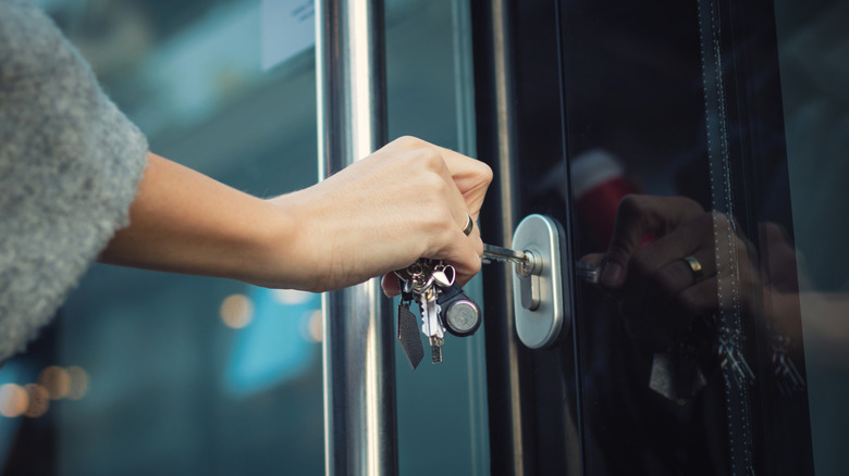 Someone unlocking their front door