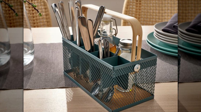 IKEA VIMPELFISK filled with utensils on a table