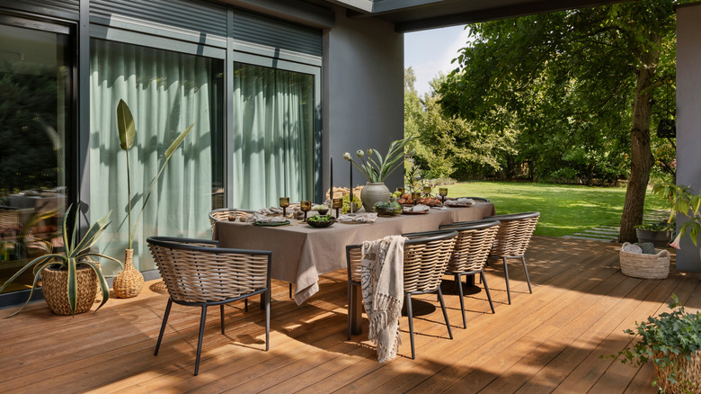 Outdoor dining table with chairs on a patio