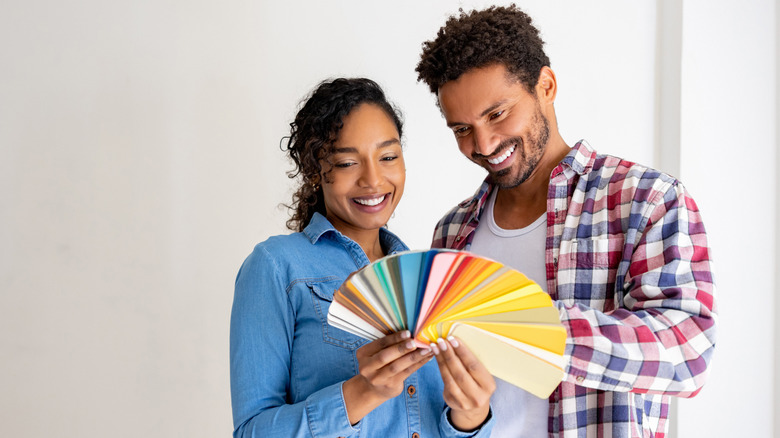 Couple looking at paint options