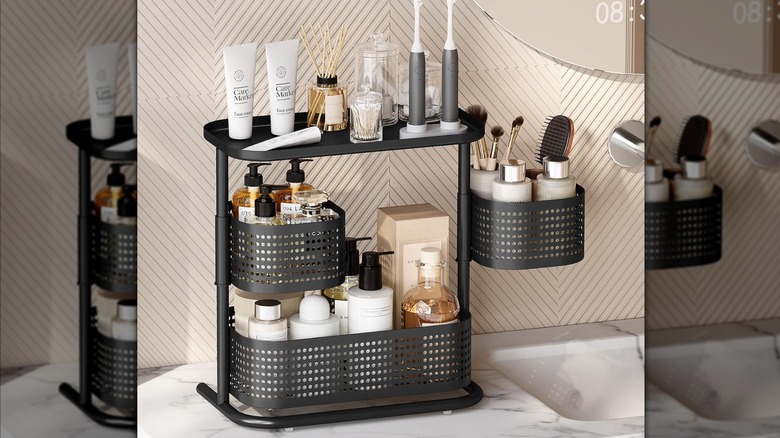 Tiered-organizer being used to hold toiletries on bathroom counter