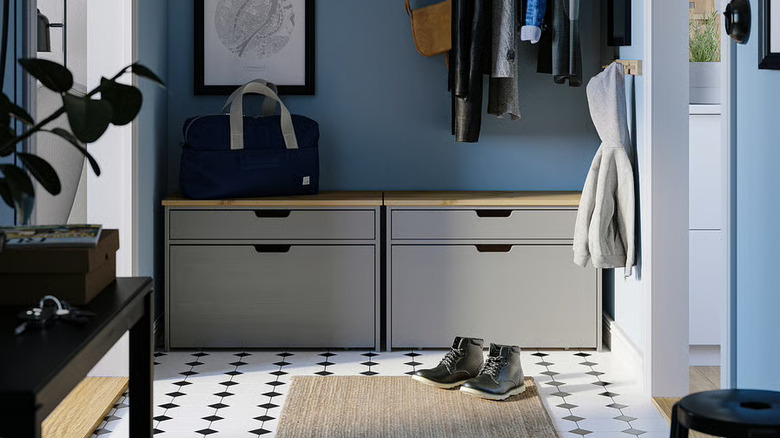 Two Kallsӧ Storage benches at the end of a hallway between two rooms