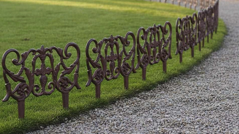 Esschert Design's ornate lawn edging along the edge of a sweeping driveway