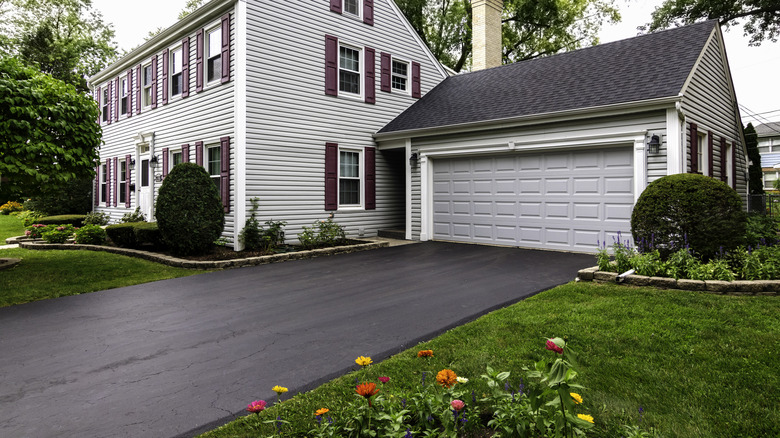 Paved driveway without any edging.
