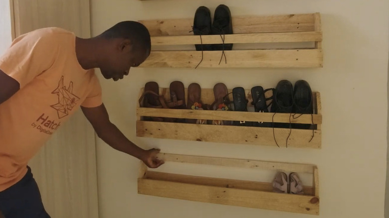 Man with the pocket shelf he built