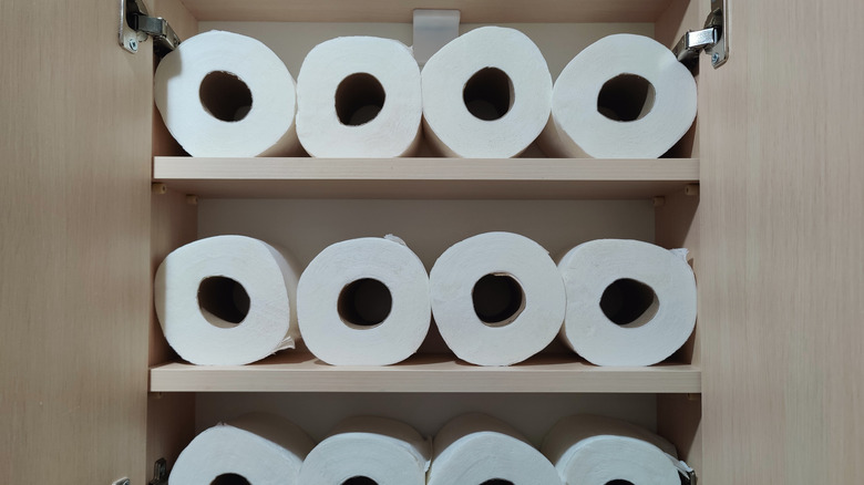cabinet filled with paper toilet