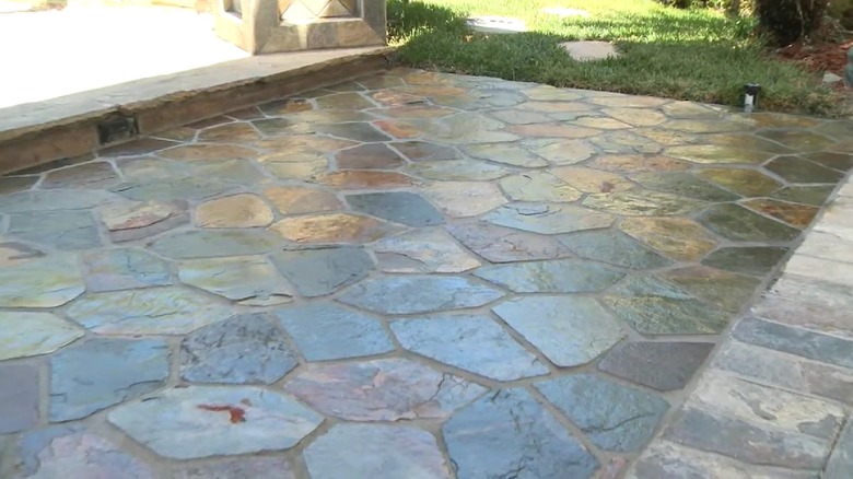 A patio area with meshed flagstone surface.