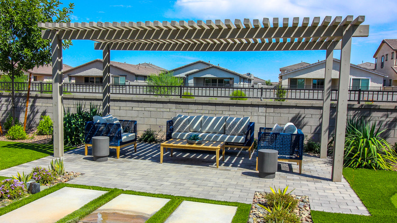 A patio made with stylish, eco-friendly limestone pavers