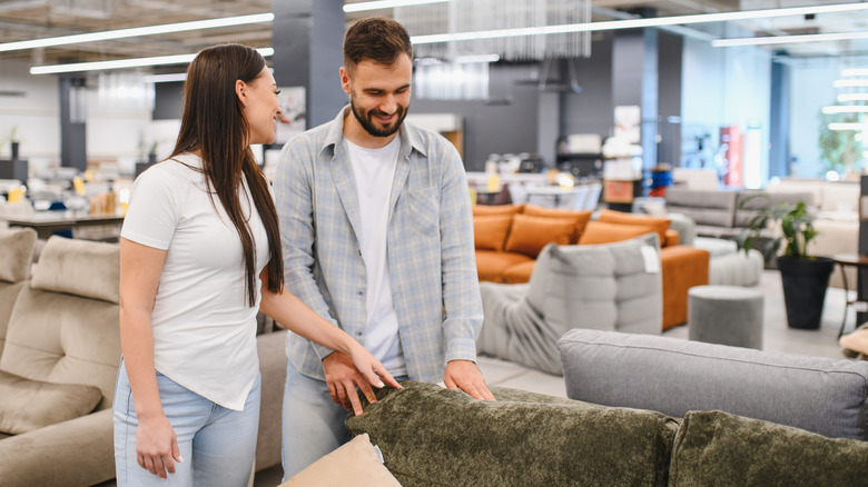 Couple shopping for new furniture