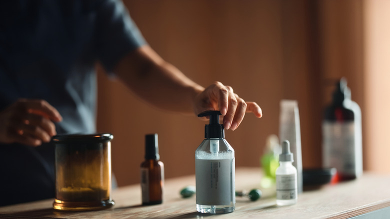 person examining common bathroom products
