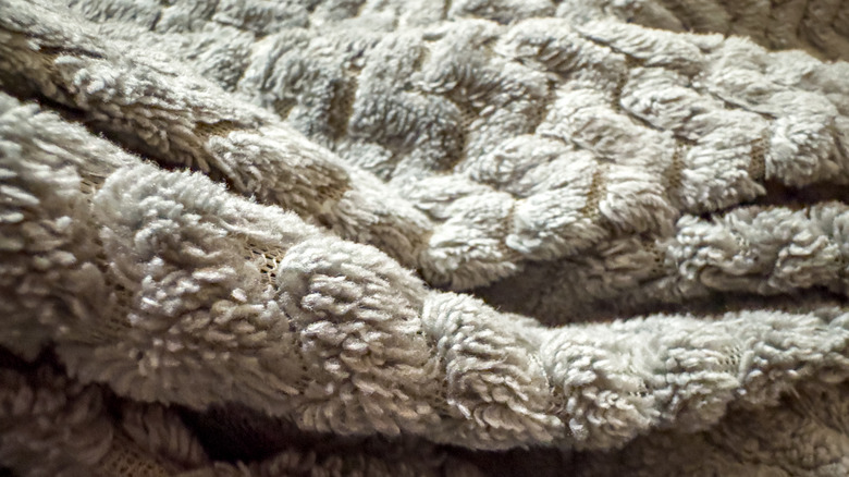 Comfy light tan chenille bedspread