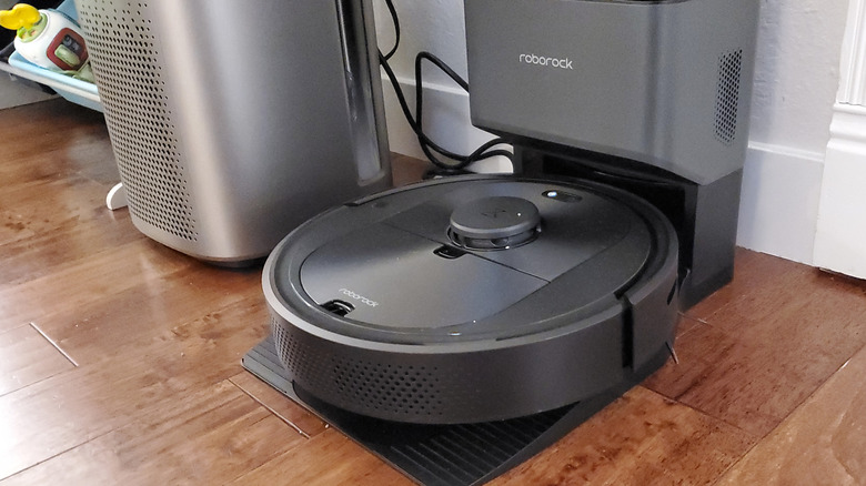 Roborock robotic vacuum on its charging station