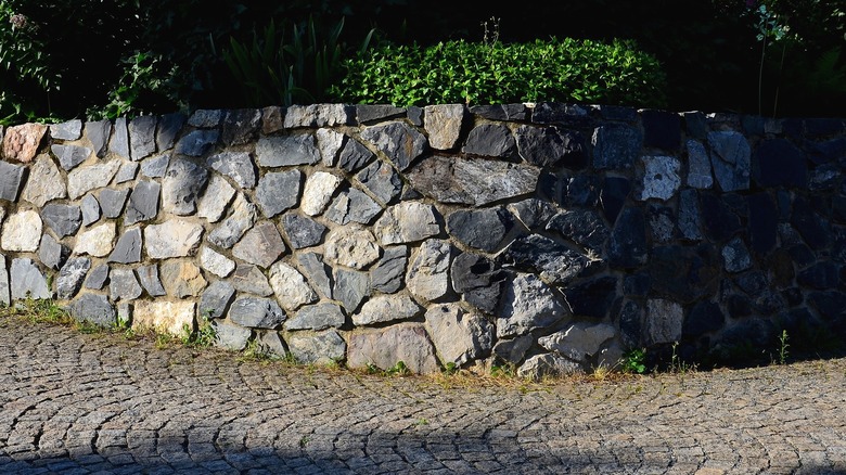 An eye-catching retaining wall built using coarse basalt