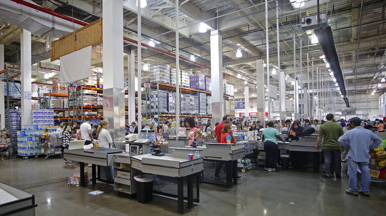 Several customers are shopping at a Costco warehouse