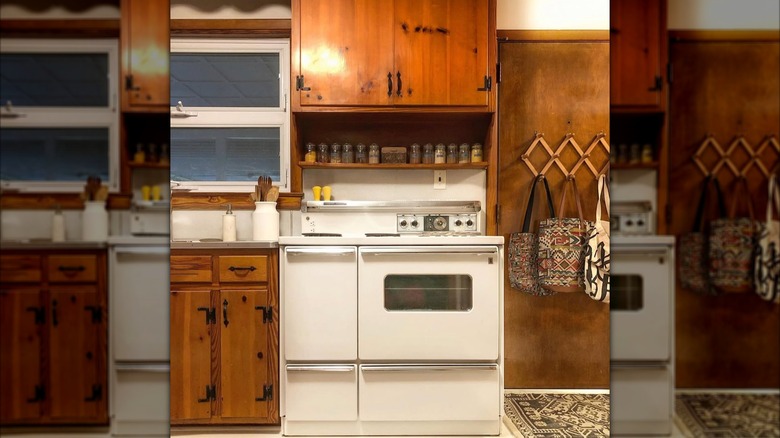 A preserved kitchen with knotty pine cabinets.