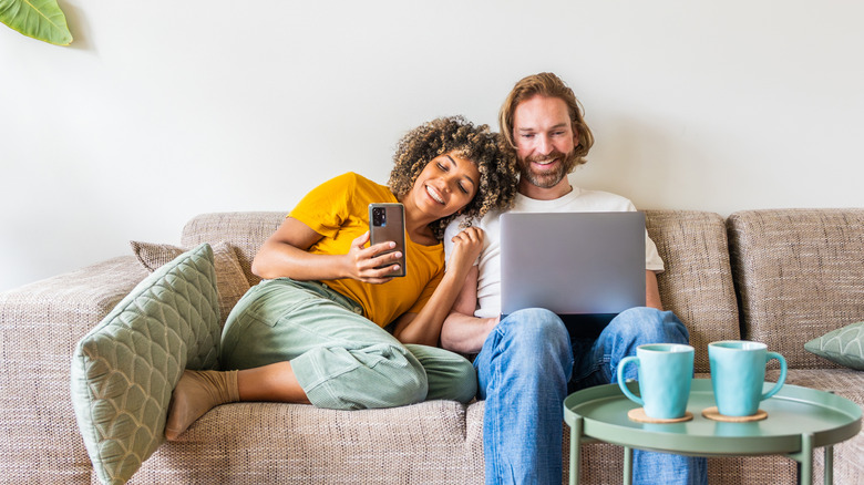 couple shopping on their devices