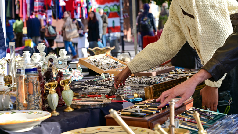 people looking through flea market