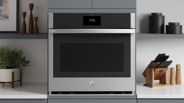A single GE wall oven installed in a contemporary kitchen