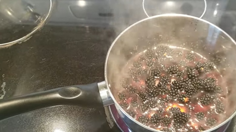 Blackberries boiling in a saucepan