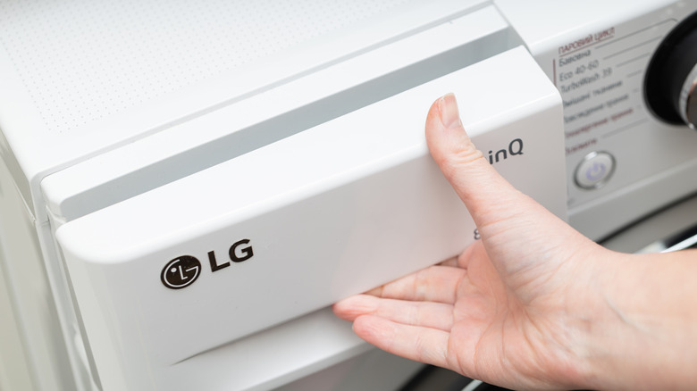 opening compartment on LG washing machine