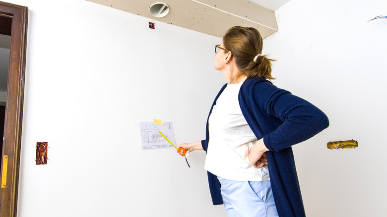 a person planning an office built-in