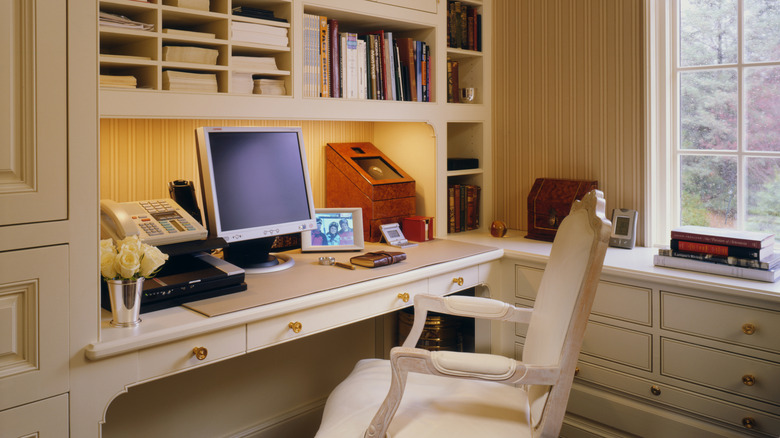a picture of a well-organized built-in home office