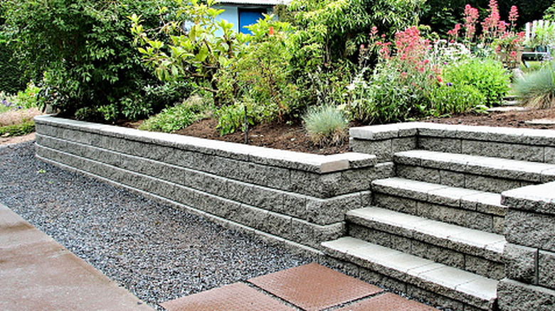 A sloped garden with an attractive retaining wall