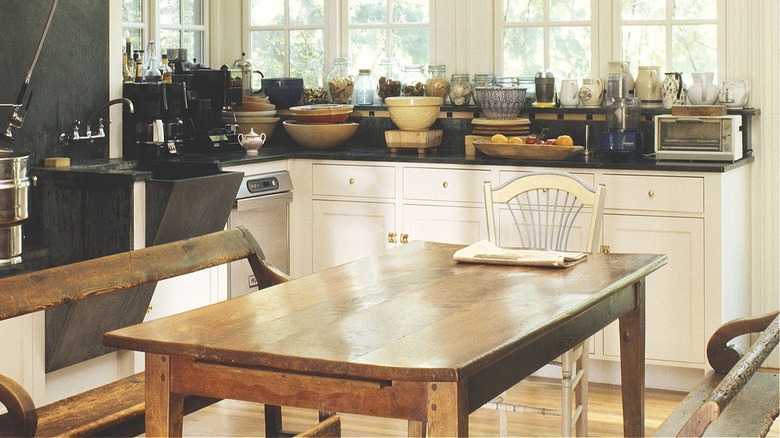 Cozy kitchen with copper and steel appliances