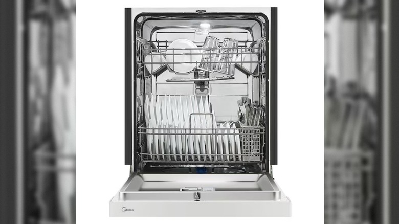 Midea MDF24P2BWW dishwasher filled with utensils