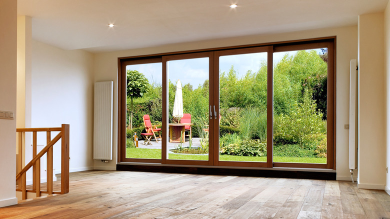 An interior shot of sliding glass door wood trim
