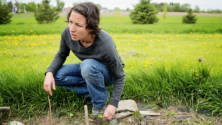 Woman looking at her garden
