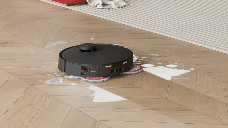 YEEDI M12 Pro+ using mop pads to clean up mess on floor