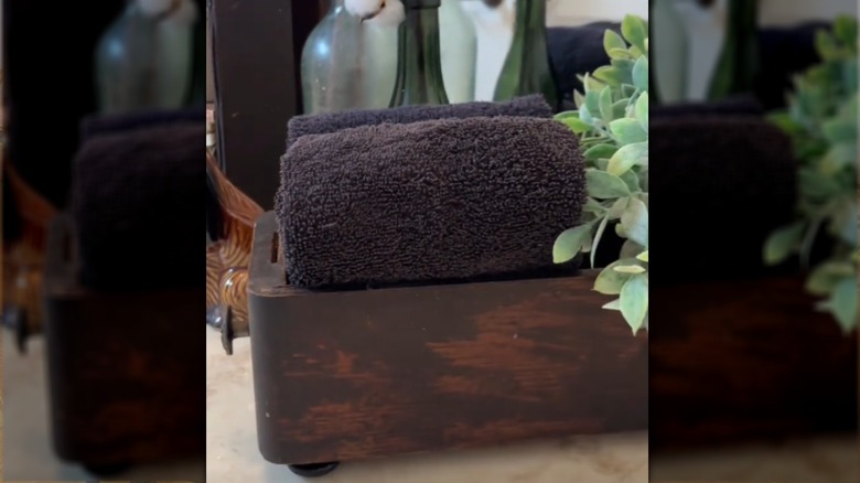 The finished drawer turned bathroom decor