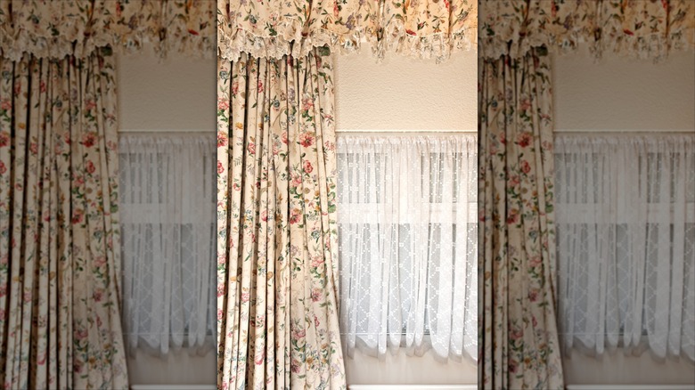 Window with floral chintz curtains and valance